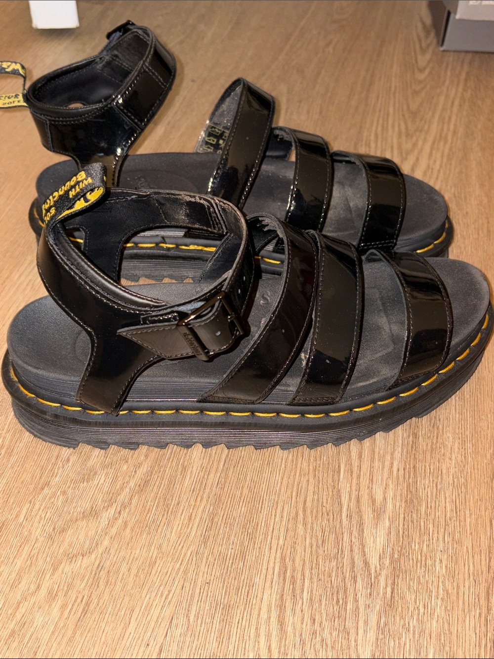 Dr. Martens Black Patent Strappy Platform Sandals with Yellow Stitching